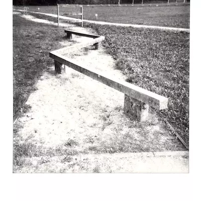 Concrete obstacles from the NATO training course at Moudon military barracks, zigzag-shaped barriers, black and white Polaroid photograph