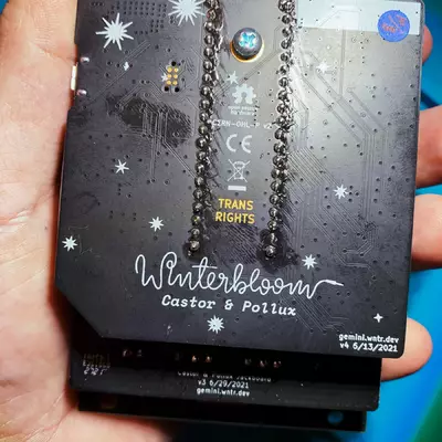 The back of the module with the mention trans rights