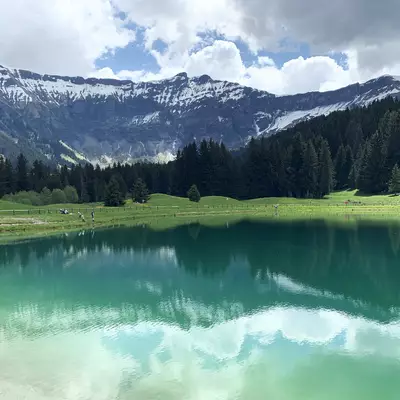 The lake with the mountains in the background